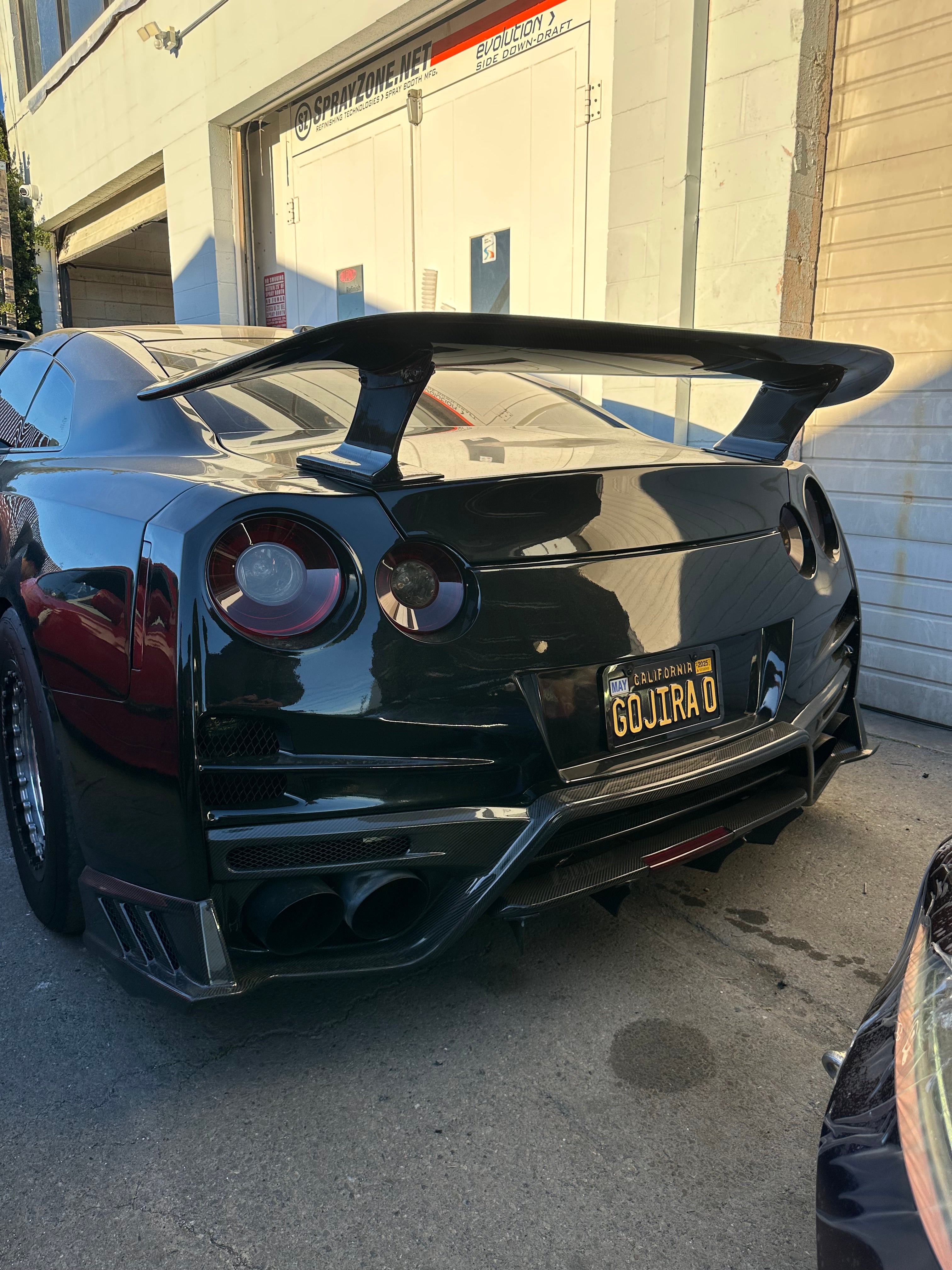 TS-Style Carbon Fiber Rear Diffuser W/BrakeLight - Nissan GTR R35